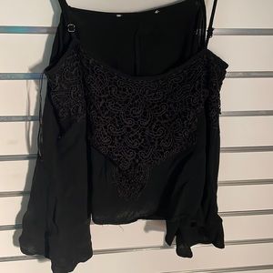 Lacy solid black dressy top